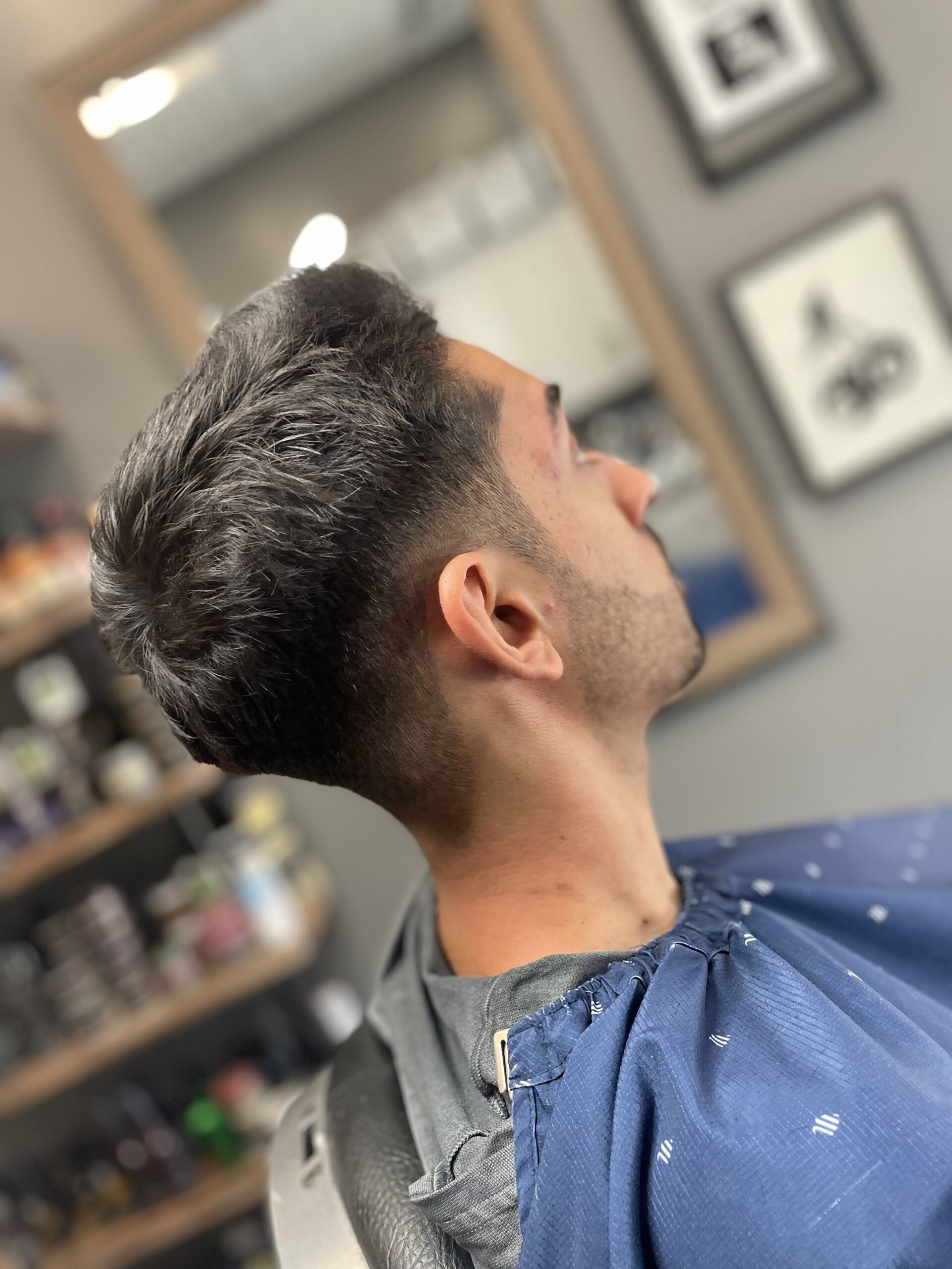 Clean taper haircut by LV Barbershop